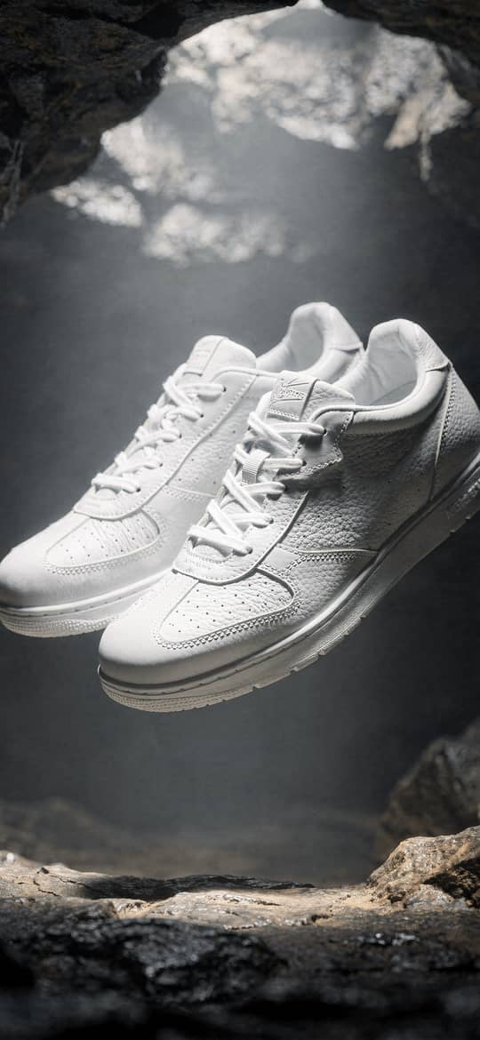 White Sneakers Floating in Rocky Cave
