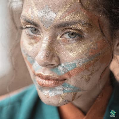 Woman with Gold Teal Metallic Face Paint