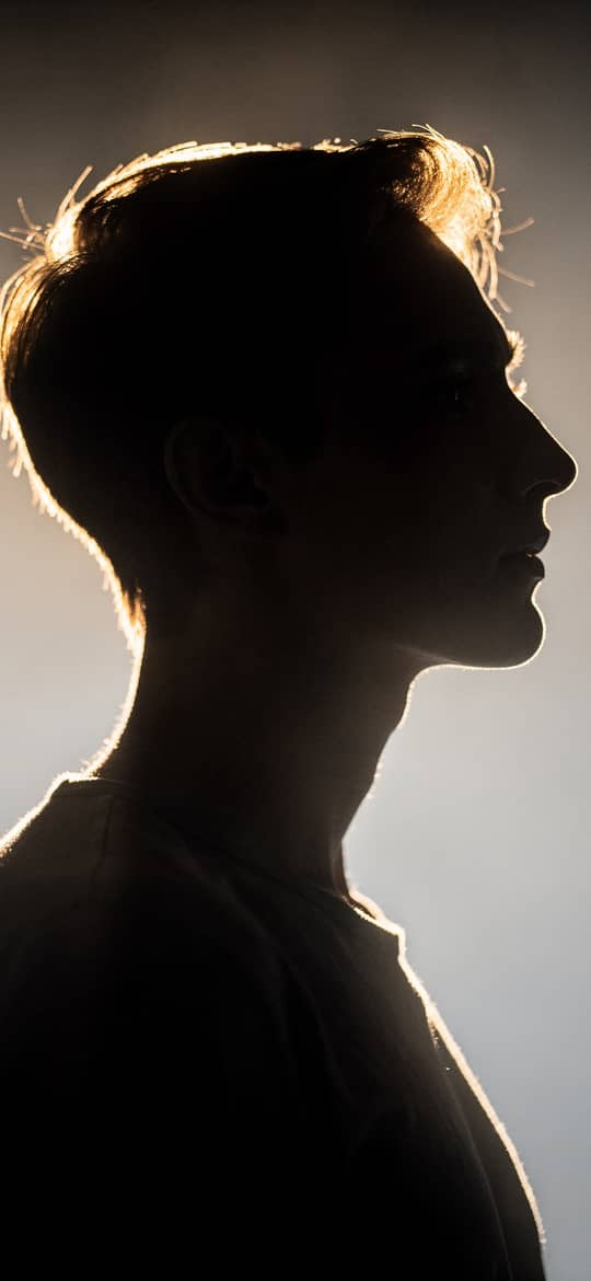 Backlit Young Man Profile Silhouette