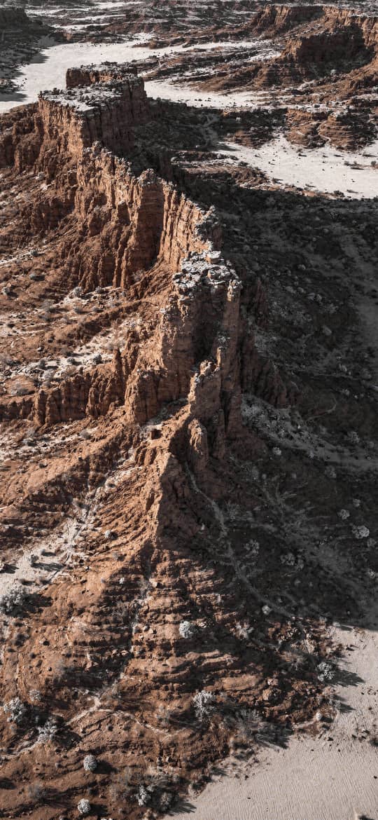 Eroded Rock Spire in Desert Canyon