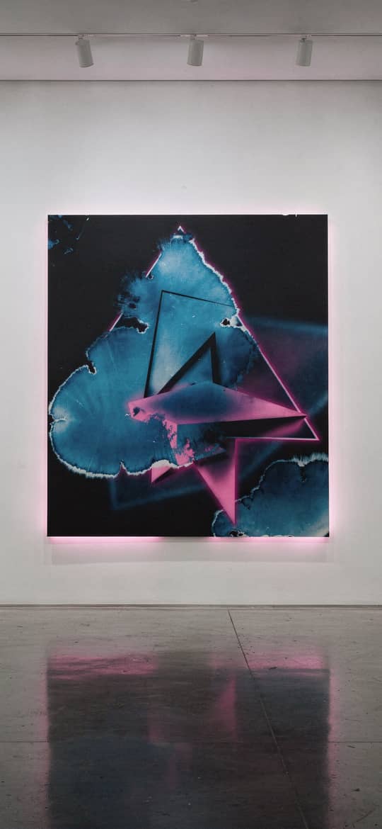 Fragmented Blue Form with Pink Triangles