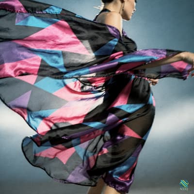 Woman in Swirling Geometric Dress