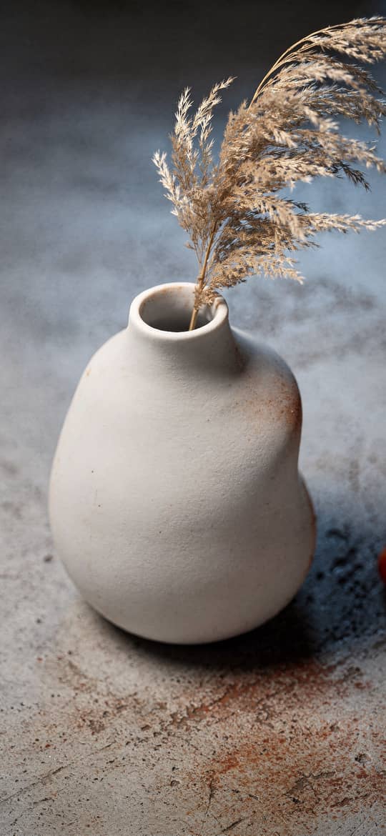 White Ceramic Vase with Dried Grass