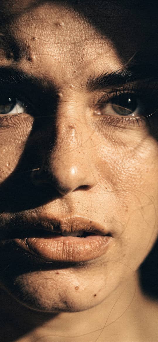 Woman's Face in Dramatic Shadows